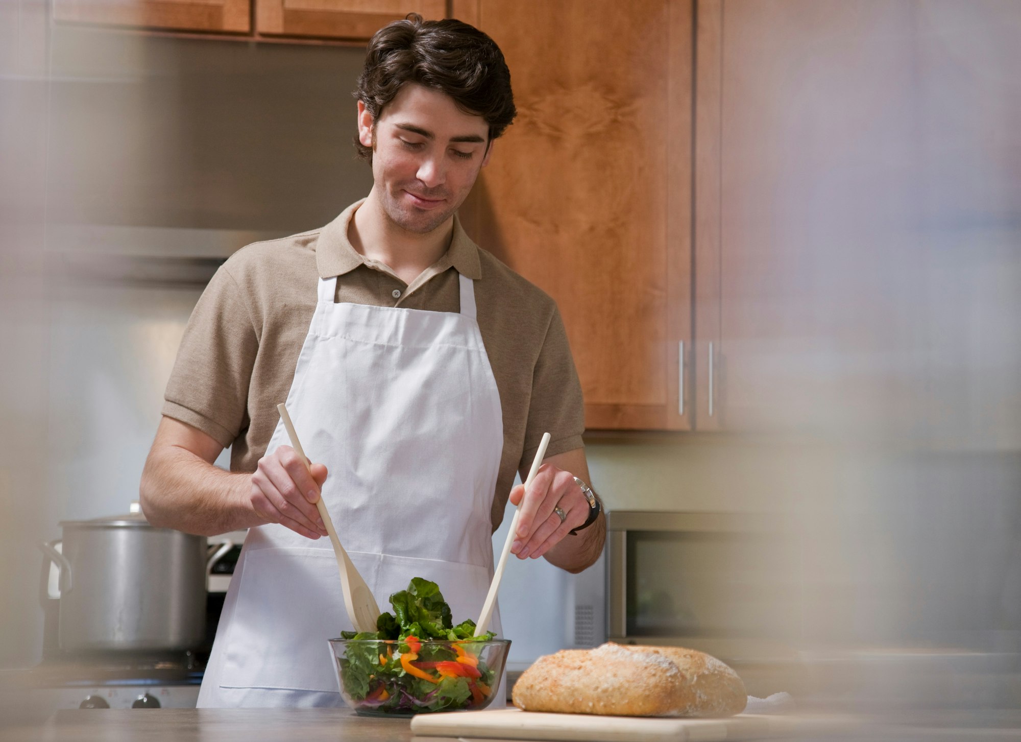 man cooking in kitchen